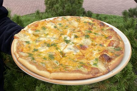 Пицца четыре сыра