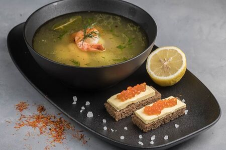 Уха из осетрины с красной икрой