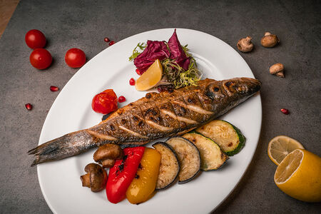 Рыба запеченная с овощами