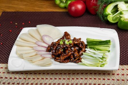 Жаренное мясо по-пекински с соевым соусом