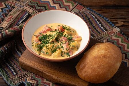 Рапаны в сливочном соусе с лавашом