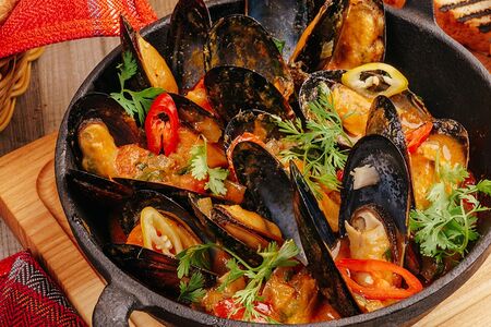 Мидии в соусе Шампань