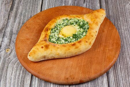 Хачапури по-аджарски со шпинатом и сыром