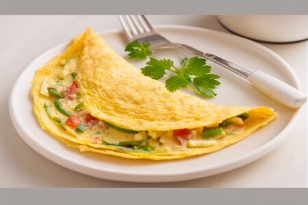 Омлет с сыром и томатами