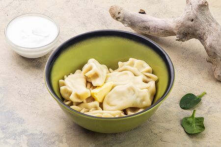 Вареники с сырым картофелем и шпиком