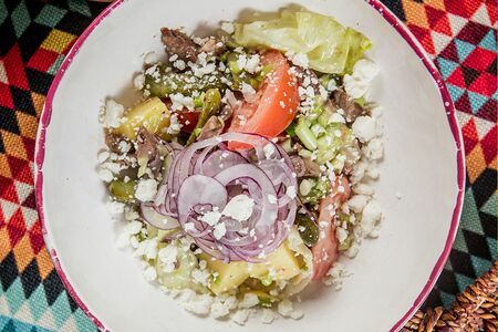 Салат под соусом Аджика