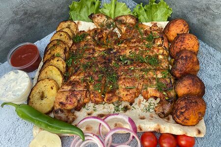 Курица целиком на мангале