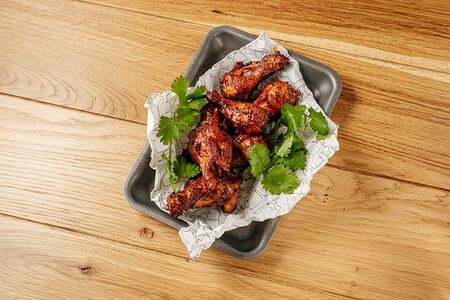 Куриные крылышки в кисло-сладком соусе