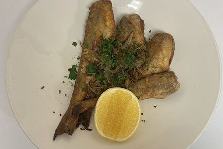 Жареная навага с луком