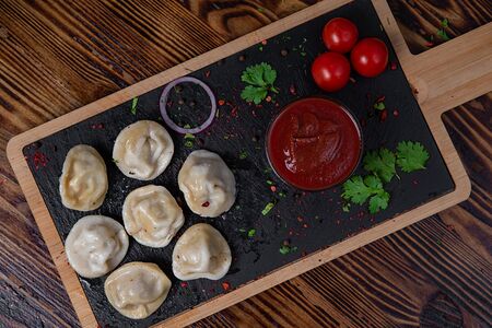 Пельмени отварные со свининой и говядиной