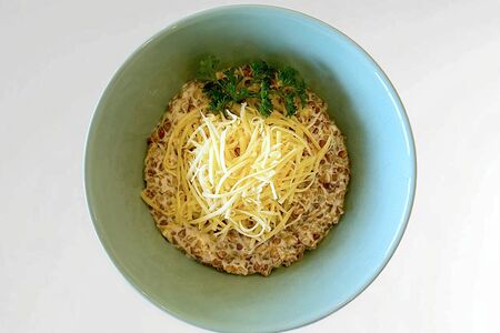 Греча с сыром и вялеными томатами