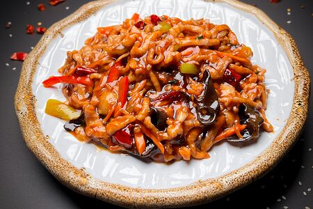 Свинина острая тушеная