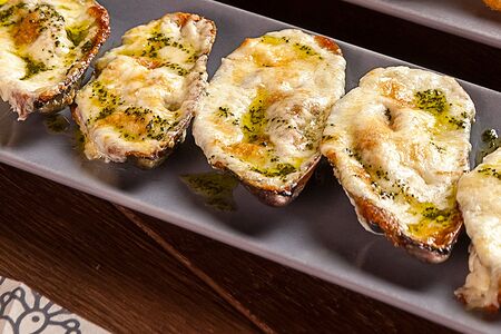 Мидии, запеченные под сыром моцарелла