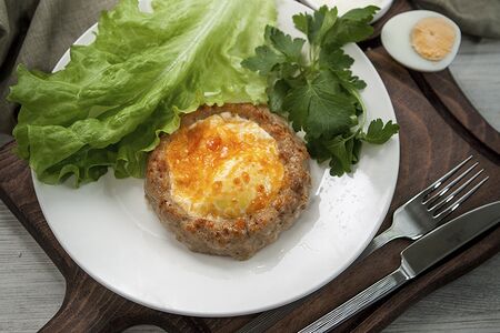 Шницель с яйцом