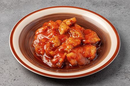 Свинина жаренная в кисло-сладком соусе