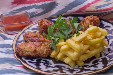 Куриные крылышки соусом Барбекю