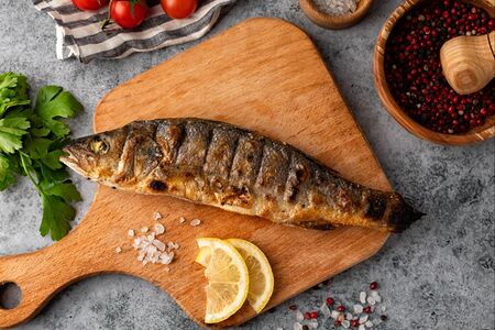 Сибас с зеленью запеченный на гриле