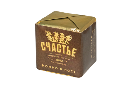 Конфета пралине в горьком шоколаде с кунжутом и морской солью