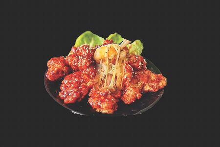 Жареные куриные бедрышки в кисло-сладком соусе