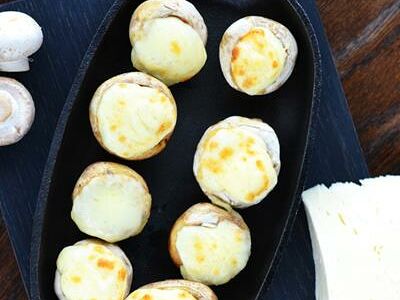 Шампиньоны жареные с сыром