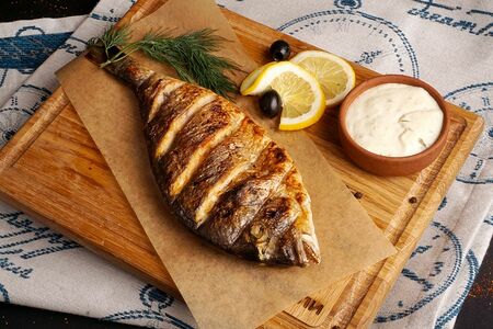 Дорадо на мангале