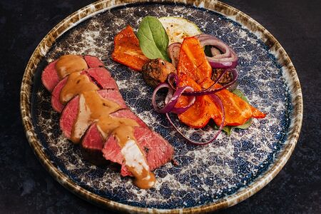 Филе миньон с печёными овощами