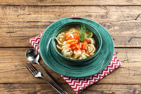 Пельмени с фирменным бульоном