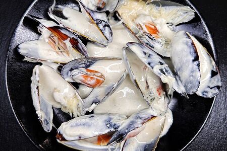 Мидии в сливочном соусе