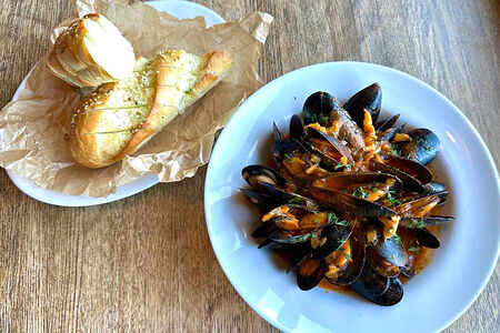 Мидии в томатном соусе