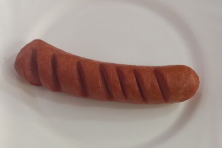 Сосиска запеченная