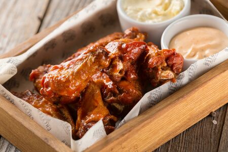 Куриные крылья в соусе