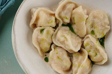 Пельмени с гребешком и креветкой