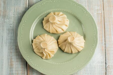 Хинкали с цыпленком Чкмерули