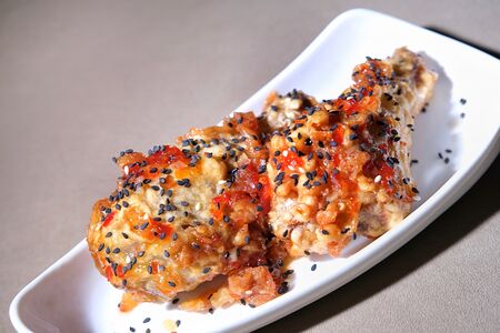 Куриные ножки в панировке с соусом сладкий чили