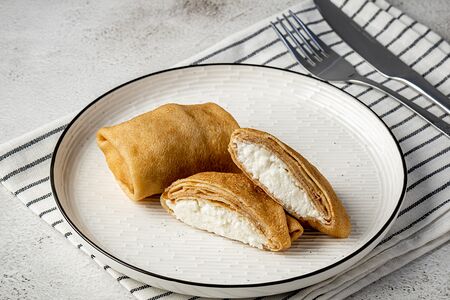 Блины фаршированные творогом