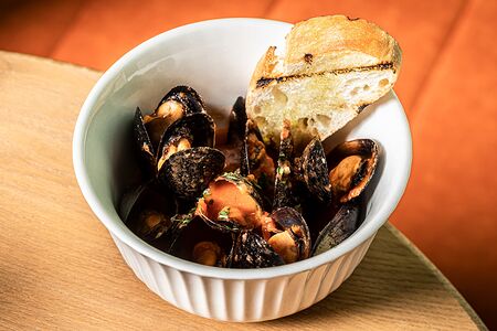 Мидии в томатном соусе