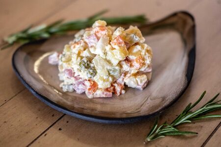 Оливье с колбасой