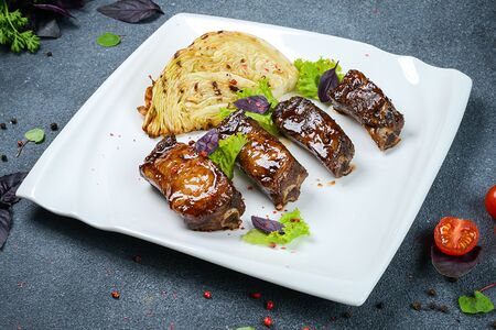 Свиные ребрышки в гранатовом соусе