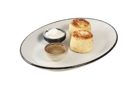 Сырники с медом и сметаной