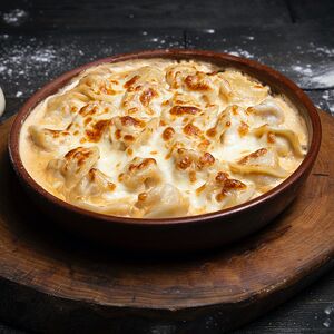 Пельмени куриные под сырной корочкой