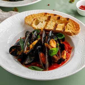 Мидии в томатном соусе