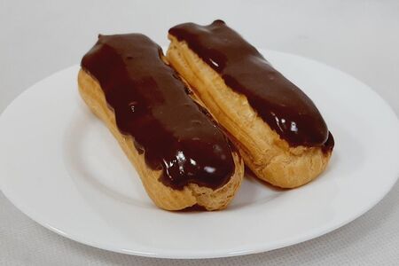 Пирожное Эклер со сливками