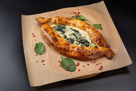 Хачапури по-аджарски с сыром и шпинатом