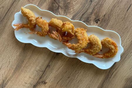 Креветки в кляре с соусом терияки