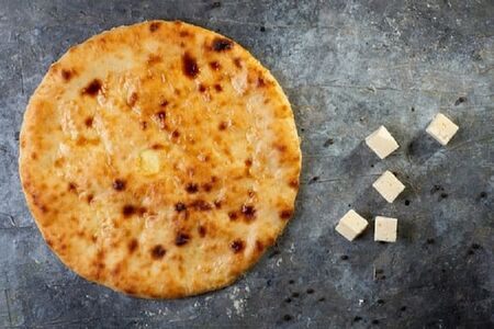 Осетинский пирог с сыром и зеленым луком