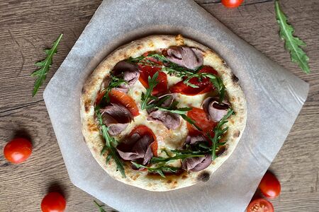 Пицца с говядиной