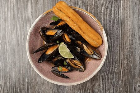 Мидии в сливочном соусе