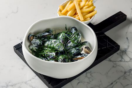 Мидии в соусе рокфор