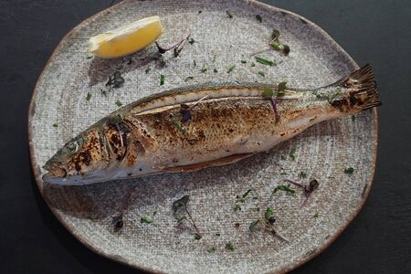 Целая рыба Сибас