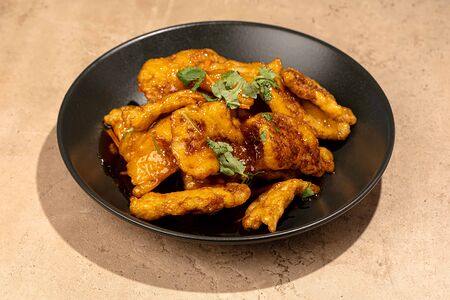 Свинина в кисло-сладком соусе Губао Роу